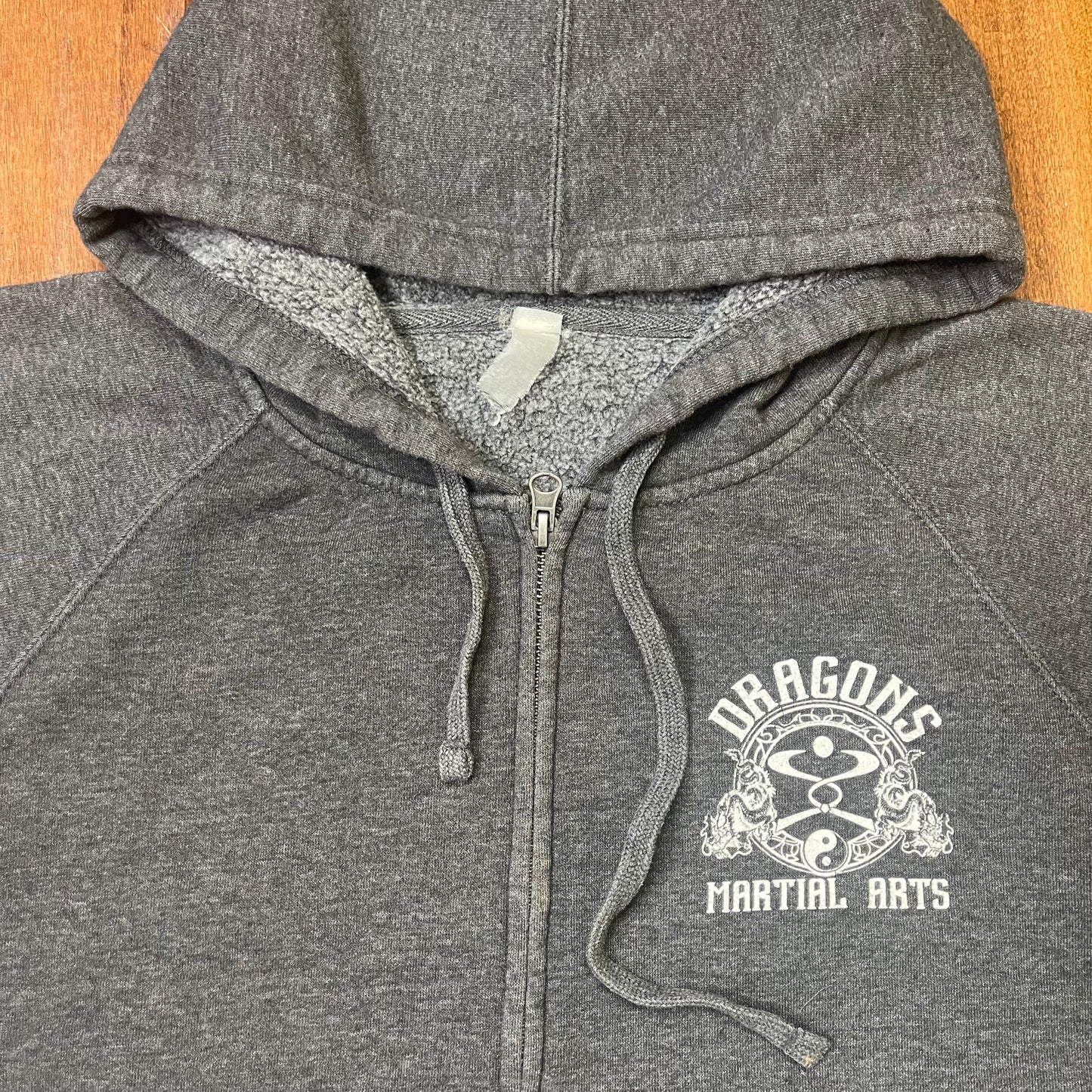 THRIFTED “DRAGONS MARTIAL ARTS” ZIP-UP HOODIE