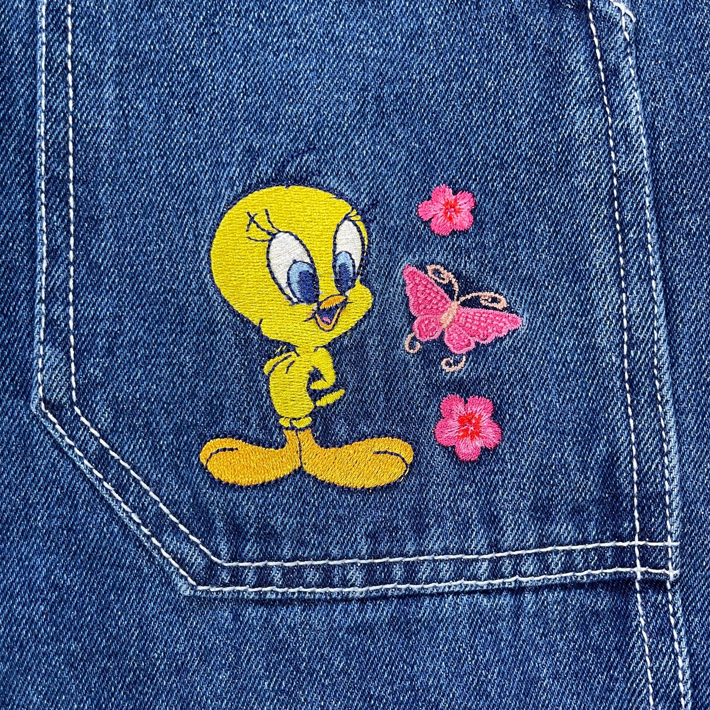 VINTAGE TWEETY BIRD HIGH-WAISTED JEAN SHORTS