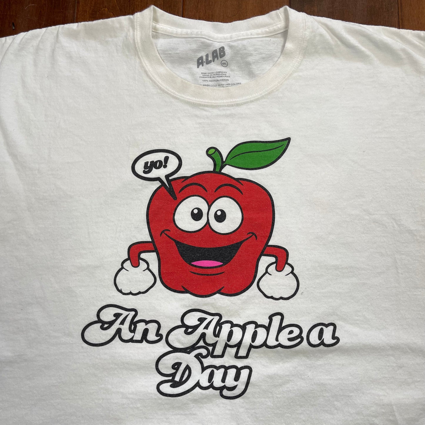 THRIFTED “AN APPLE A DAY” T-SHIRT